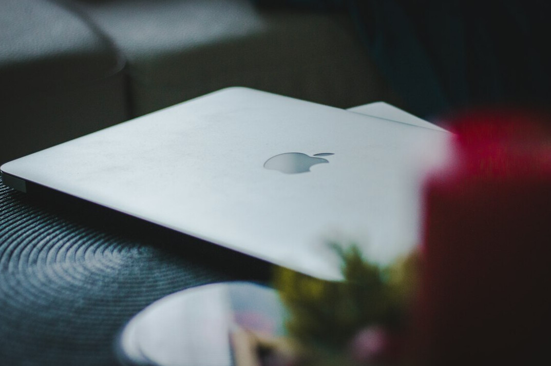 Laptop, notebook and coffee on a desk